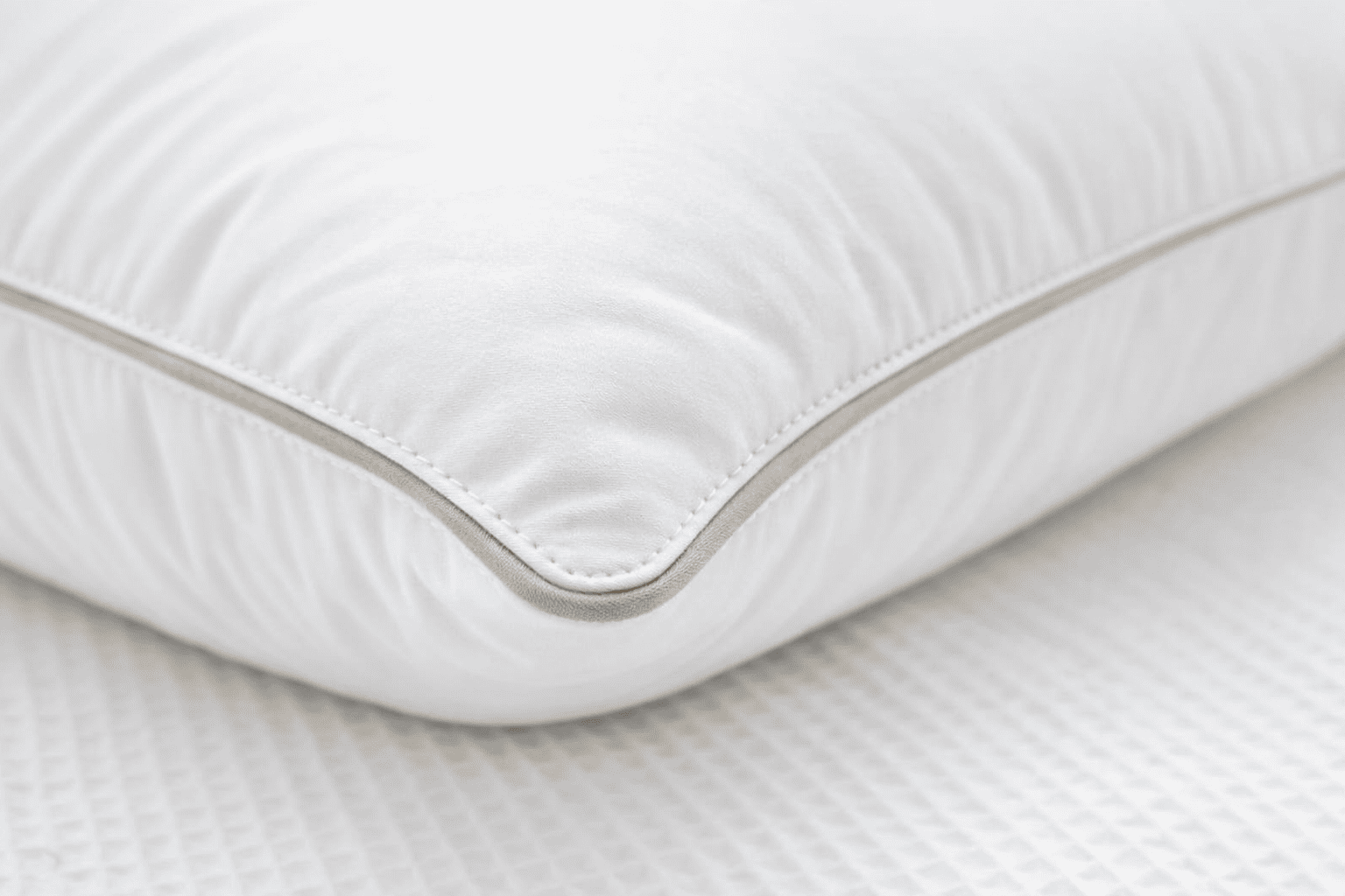 Custom piping detail on pillow edge